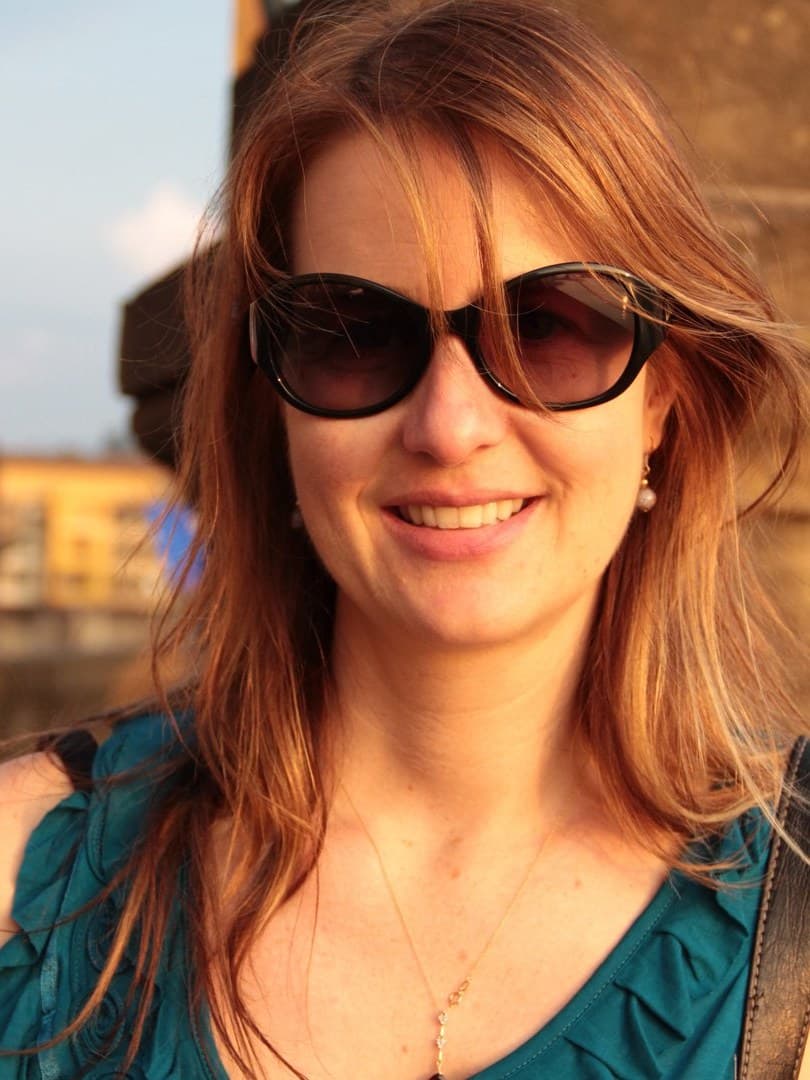Marjorie, the founder of Points Navigator, photographed while travelling at golden hour.